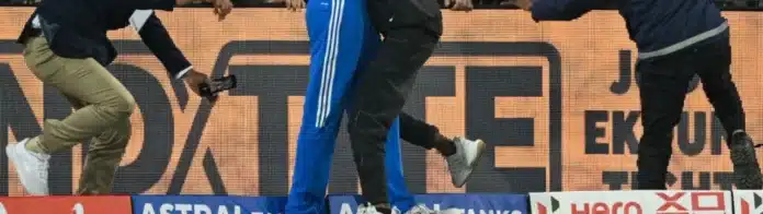 Fan Hugs Virat Kohli